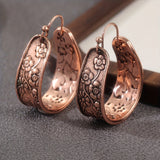 Boucles ancien floral cuivre