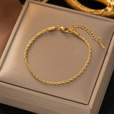 Bracelet torsadé chaîne | or