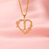 Collier floral breloque initiale | or