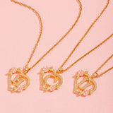 Collier floral breloque initiale | or