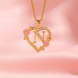 Collier floral breloque initiale | or