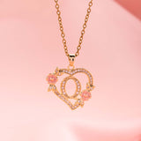 Collier floral breloque initiale | or