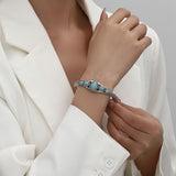 Bracelet turquoise goutte ouvert | or blanc