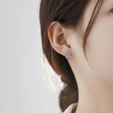 Boucles Aurelie fleur | or blanc