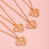 Collier floral breloque initiale | or
