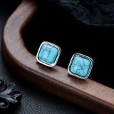 Puces turquoise carré | or blanc