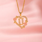 Collier floral breloque initiale | or