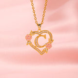 Collier floral breloque initiale | or