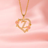 Collier floral breloque initiale | or