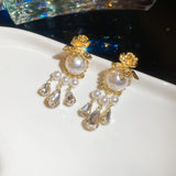 Boucles pendantes Ivoria perle Dew | or
