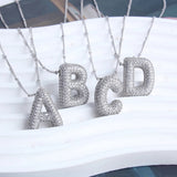 Collier bulle lettre initiale ensemble | or blanc