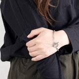 Bracelet maille T-barre | or blanc